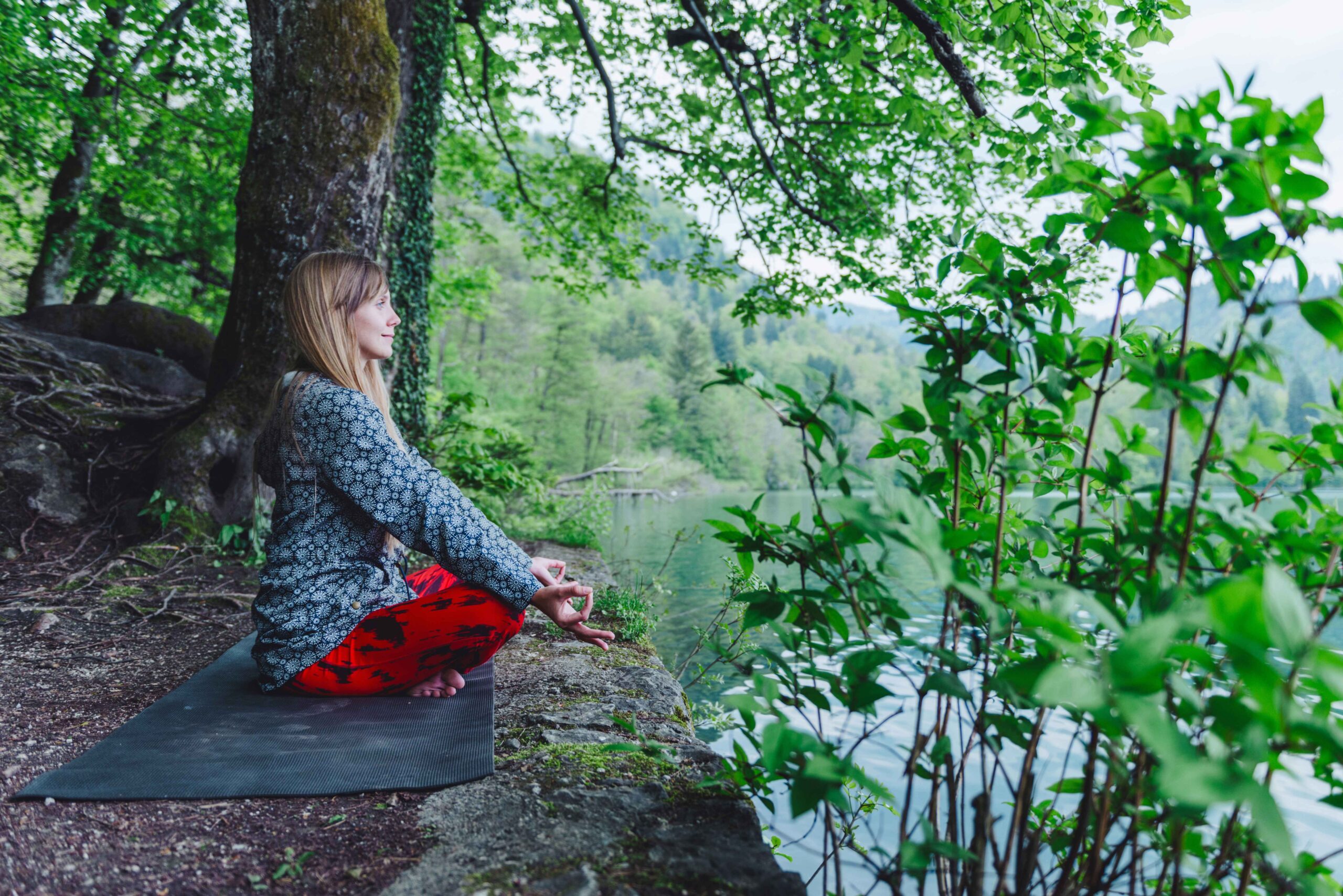 meditating-by-the-lake-2023-11-27-04-55-35-utc_11zon